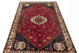 Surface texture of 1970s Shiraz rug with natural Wool and intricate pattern