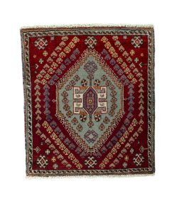 Full view of 2000s Shiraz rug from Iran / Persia, 63 × 55 cm in Red tones