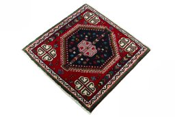 Corner detail of 2000s Shiraz rug showing border pattern and Wool pile