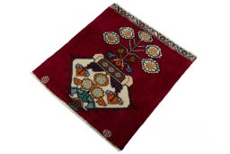 Corner detail of 2000s Shiraz rug showing border pattern and Wool pile