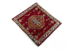 Corner detail of 2000s Shiraz rug showing border pattern and Wool pile