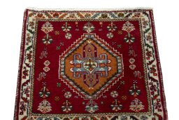 Surface texture of 2000s Shiraz rug with natural Wool and intricate pattern