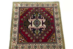 Surface texture of 2000s Shiraz rug with natural Wool and intricate pattern