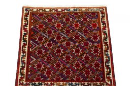 Surface texture of 2000s Shiraz rug with natural Wool and intricate pattern