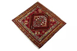 Corner detail of 2000s Shiraz rug showing border pattern and Wool pile