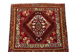 Surface texture of 2000s Shiraz rug with natural Wool and intricate pattern