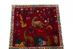 Surface texture of 2000s Shiraz rug with natural Wool and intricate pattern