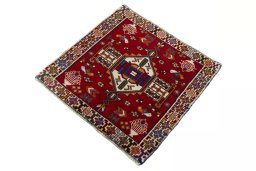 Corner detail of 2000s Shiraz rug showing border pattern and Wool pile