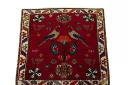 Surface texture of 2000s Shiraz rug with natural Wool and intricate pattern