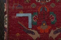 Backside of handmade 2000s Shiraz rug showing knot structure and weave density