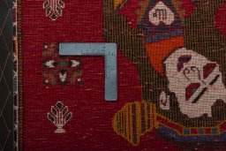 Backside of handmade 2000s Shiraz rug showing knot structure and weave density
