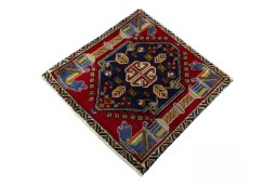 Corner detail of 2000s Shiraz rug showing border pattern and Wool pile