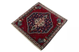 Corner detail of 2000s Shiraz rug showing border pattern and Wool pile