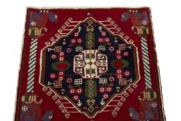 Surface texture of 2000s Shiraz rug with natural Wool and intricate pattern