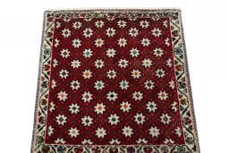 Surface texture of 2000s Shiraz rug with natural Wool and intricate pattern