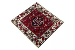 Corner detail of 2000s Shiraz rug showing border pattern and Wool pile