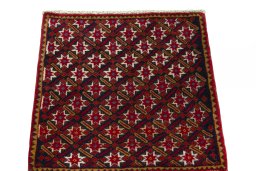 Surface texture of 2000s Shiraz rug with natural Wool and intricate pattern