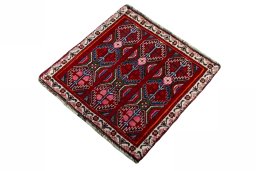 Corner detail of 2000s Shiraz rug showing border pattern and Wool pile