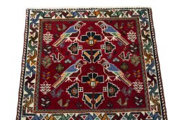 Surface texture of 2000s Shiraz rug with natural Wool and intricate pattern