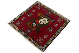 Corner detail of 2000s Shiraz rug showing border pattern and Wool pile