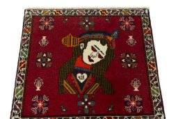 Surface texture of 2000s Shiraz rug with natural Wool and intricate pattern