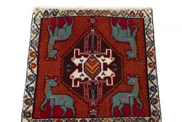 Surface texture of 2000s Shiraz rug with natural Wool and intricate pattern