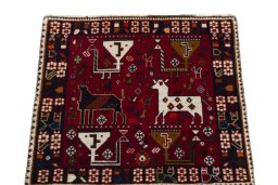 Surface texture of 2000s Shiraz rug with natural Wool and intricate pattern