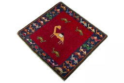 Corner detail of 2000s Shiraz rug showing border pattern and Wool pile