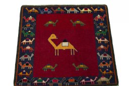 Surface texture of 2000s Shiraz rug with natural Wool and intricate pattern