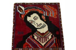 Surface texture of 2000s Shiraz rug with natural Wool and intricate pattern