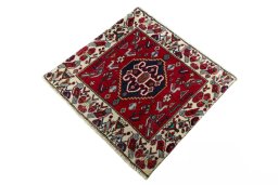 Corner detail of 2000s Shiraz rug showing border pattern and Wool pile