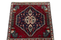 Surface texture of 2000s Shiraz rug with natural Wool and intricate pattern