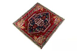 Corner detail of 2000s Shiraz rug showing border pattern and Wool pile