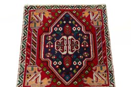 Surface texture of 2000s Shiraz rug with natural Wool and intricate pattern