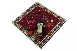 Corner detail of 2000s Shiraz rug showing border pattern and Wool pile