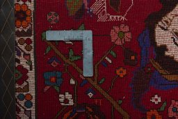 Backside of handmade 2000s Shiraz rug showing knot structure and weave density