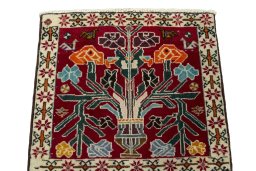 Surface texture of 2000s Shiraz rug with natural Wool and intricate pattern