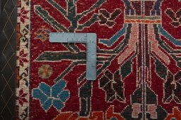 Backside of handmade 2000s Shiraz rug showing knot structure and weave density