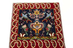 Surface texture of 2000s Shiraz rug with natural Wool and intricate pattern