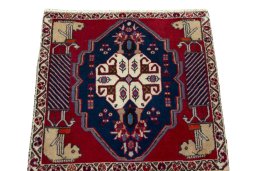 Surface texture of 2000s Shiraz rug with natural Wool and intricate pattern