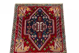 Surface texture of 2000s Shiraz rug with natural Wool and intricate pattern