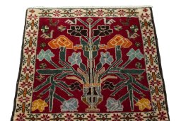 Surface texture of 2000s Shiraz rug with natural Wool and intricate pattern