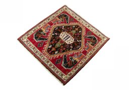 Corner detail of 2000s Shiraz rug showing border pattern and Wool pile