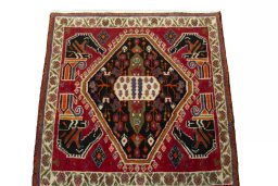Surface texture of 2000s Shiraz rug with natural Wool and intricate pattern