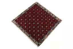 Corner detail of 2000s Shiraz rug showing border pattern and Wool pile
