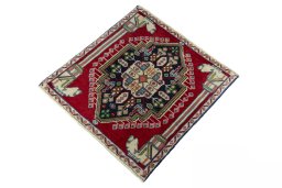 Corner detail of 2000s Shiraz rug showing border pattern and Wool pile