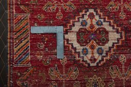 Backside of handmade 2000s Shiraz rug showing knot structure and weave density