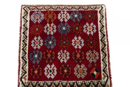 Surface texture of 2000s Shiraz rug with natural Wool and intricate pattern