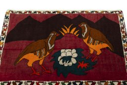 Surface texture of 2000s Shiraz rug with natural Wool and intricate pattern
