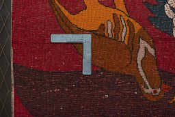 Backside of handmade 2000s Shiraz rug showing knot structure and weave density